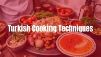 Traditional Turkish kitchen with fresh ingredients, aromatic spices, and a chef preparing a dish, warm and inviting atmosphere, realistic.