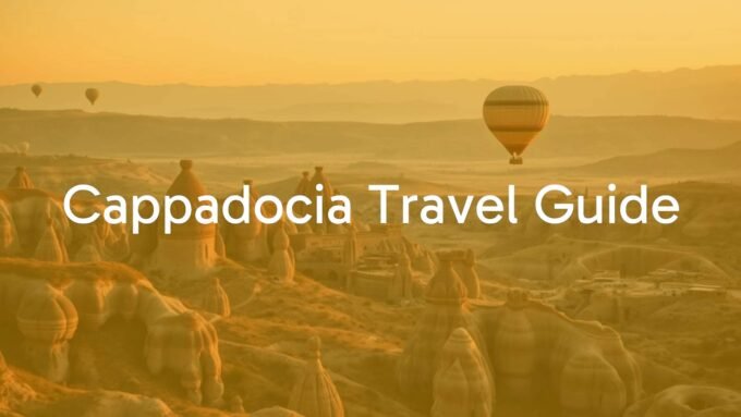 Cappadocia landscape with fairy chimneys, hot air balloons at sunrise, cave homes, and rocky valleys, photorealistic.