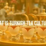 A traditional Turkish tea setting with tulip-shaped glasses, steaming tea, and a copper tea pot on a wooden tray, vibrant bazaar background, warm and inviting atmosphere, realistic.